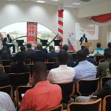 Business magnates and attendees at the colloquium