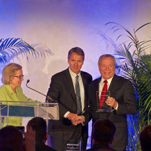 Dave Whitman accepting award