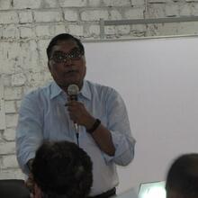 Dr. R Gopal from DYPUSM addressing the audience