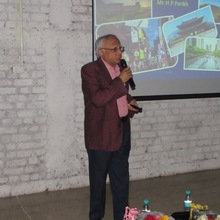 Mr Harshwadan Parekh, addressing the audience