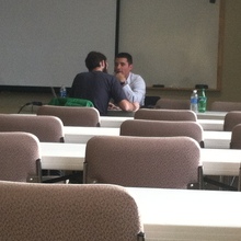 TechEx Team Member Justin Cook meets one-on-one with a business representative