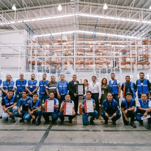 The CLA GDL team obtaining the ISO 9001:2015 recertification. 