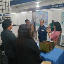 Attendees visiting Exhibitors